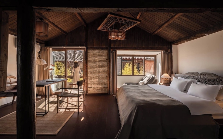 Imagen de la habitación del Hotel Lijiang Lazy Tribe Snow Mountain View Inn. Foto 1