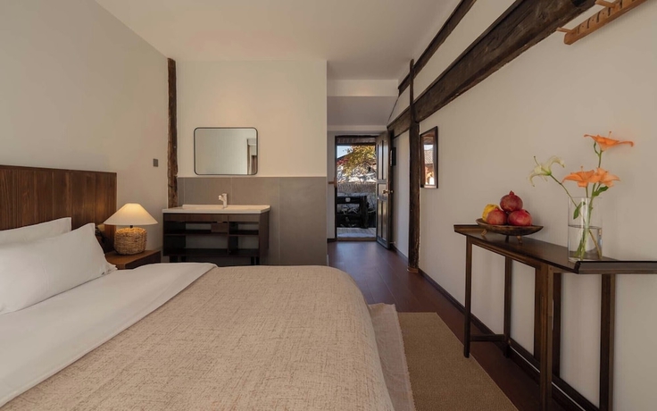Imagen de la habitación del Hotel Lijiang Lazy Tribe Snow Mountain View Inn. Foto 3