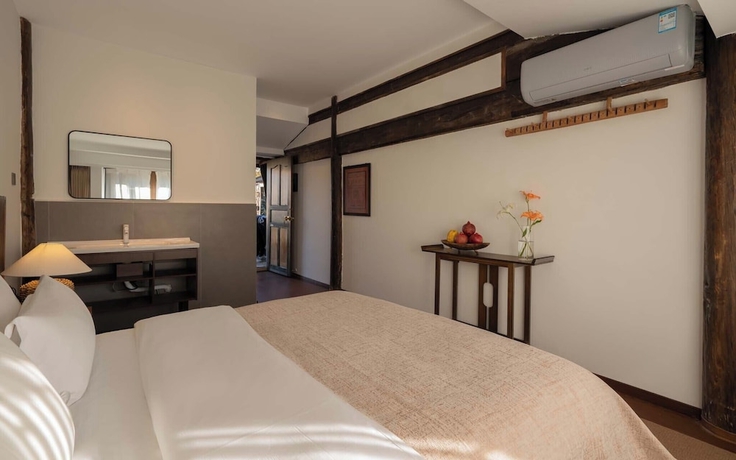 Imagen de la habitación del Hotel Lijiang Lazy Tribe Snow Mountain View Inn. Foto 4