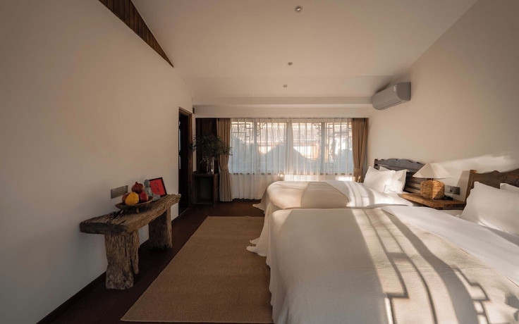 Imagen de la habitación del Hotel Lijiang Lazy Tribe Snow Mountain View Inn. Foto 5