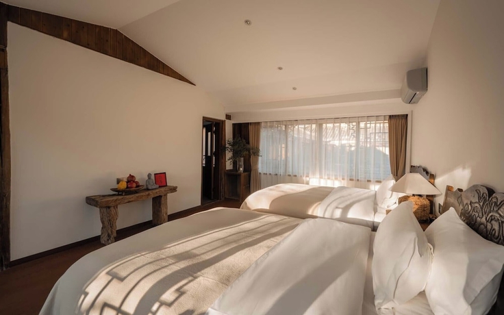 Imagen de la habitación del Hotel Lijiang Lazy Tribe Snow Mountain View Inn. Foto 6