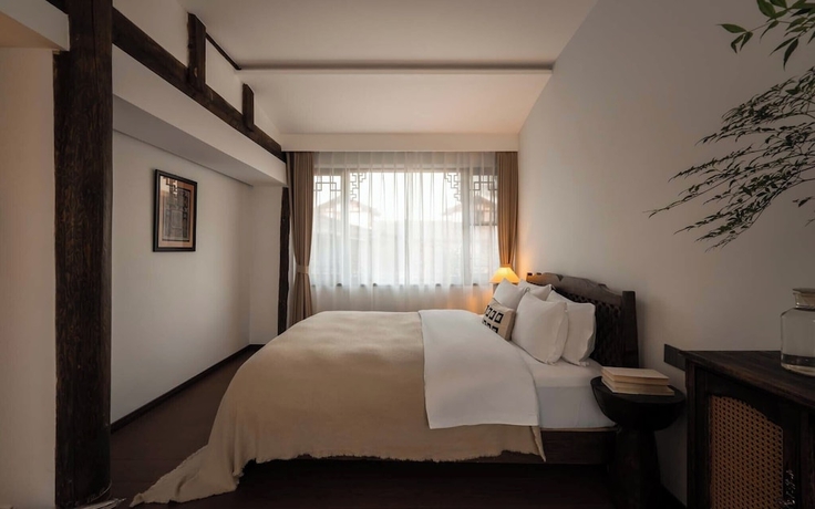 Imagen de la habitación del Hotel Lijiang Lazy Tribe Snow Mountain View Inn. Foto 7