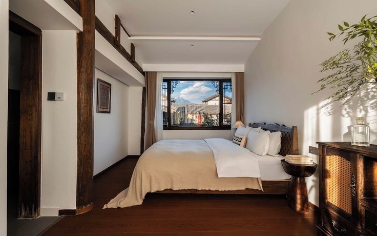 Imagen de la habitación del Hotel Lijiang Lazy Tribe Snow Mountain View Inn. Foto 8