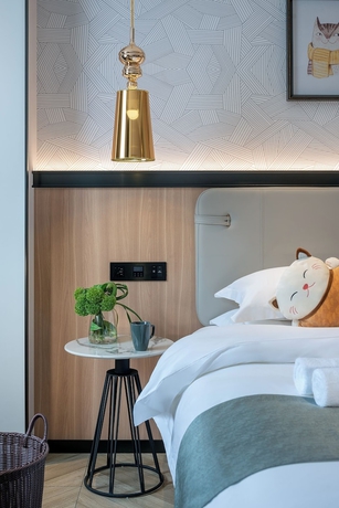 Imagen de la habitación del Hotel Lijiang MAISON. Foto 4