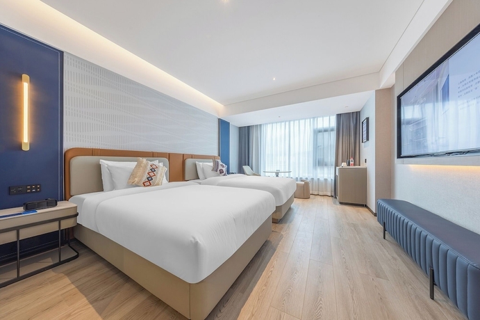 Imagen de la habitación del Hotel Lijiang OKDAY HOTEL. Foto 5