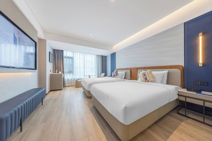 Imagen de la habitación del Hotel Lijiang OKDAY HOTEL. Foto 6