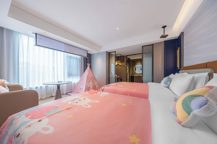 Imagen de la habitación del Hotel Lijiang OKDAY HOTEL. Foto 10