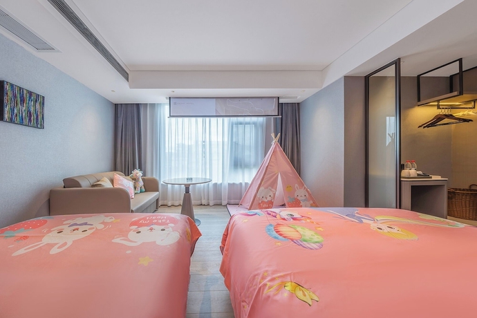 Imagen de la habitación del Hotel Lijiang OKDAY HOTEL. Foto 11