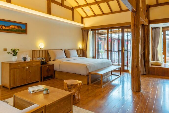 Imagen general del Hotel Lijiang Passing-cloud Resort. Foto 4