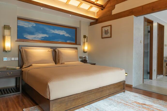 Imagen general del Hotel Lijiang Passing-cloud Resort. Foto 13