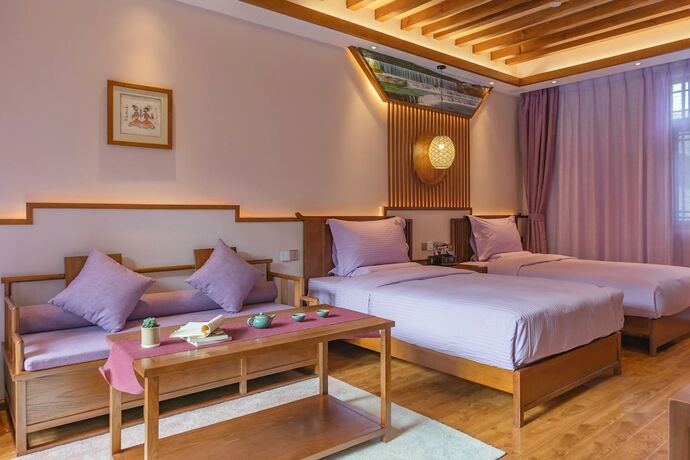 Imagen general del Hotel Lijiang Passing-cloud Resort. Foto 17