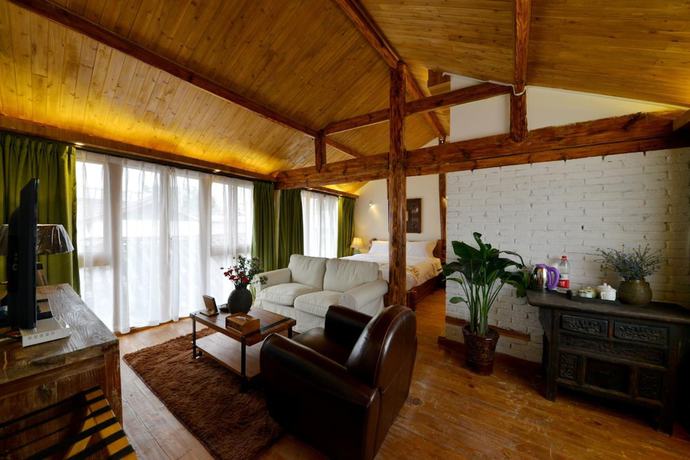 Imagen de la habitación del Hotel Lijiang Seven Island Resort. Foto 2