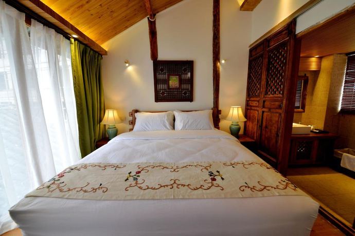 Imagen de la habitación del Hotel Lijiang Seven Island Resort. Foto 3