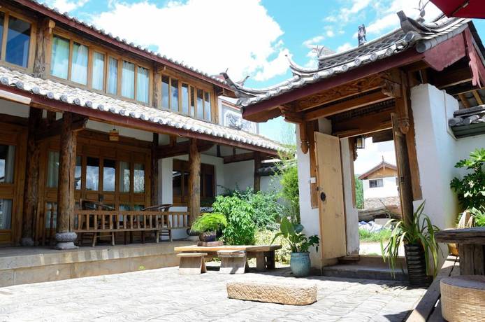 Imagen de los exteriores del Hotel Lijiang Seven Island Resort. Foto 12