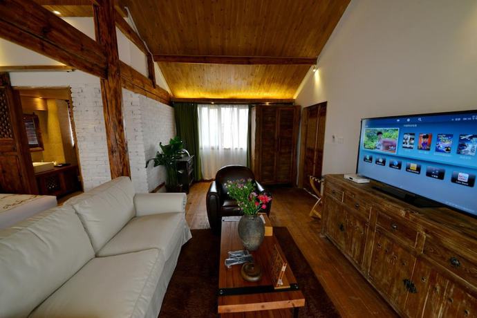 Imagen de la habitación del Hotel Lijiang Seven Island Resort. Foto 6