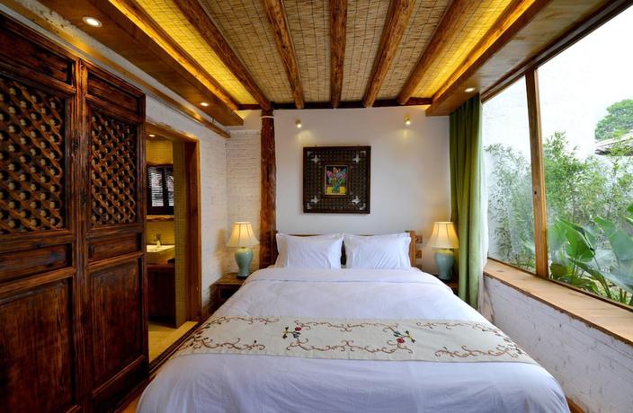 Imagen de la habitación del Hotel Lijiang Seven Island Resort. Foto 8