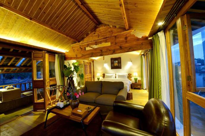 Imagen de la habitación del Hotel Lijiang Seven Island Resort. Foto 9