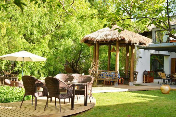 Imagen de los exteriores del Hotel Lijiang Shuhe Youyiju Private Club. Foto 16