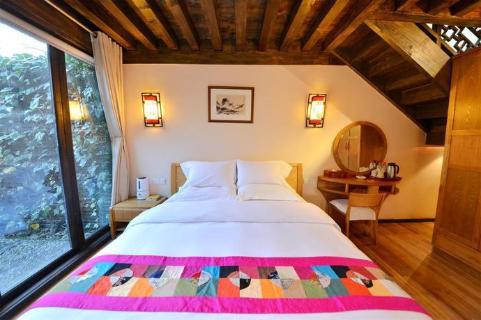 Imagen de la habitación del Hotel Lijiang Shuhe Youyiju Private Club. Foto 4