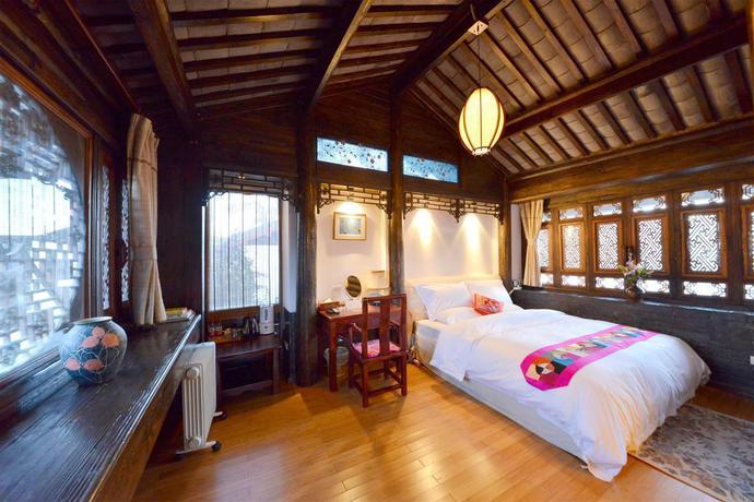 Imagen de la habitación del Hotel Lijiang Shuhe Youyiju Private Club. Foto 7