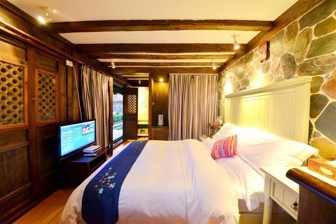 Imagen de la habitación del Hotel Lijiang Shuhe Youyiju Private Club. Foto 8