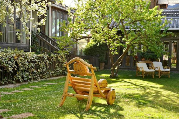 Imagen de los exteriores del Hotel Lijiang Shuhe Youyiju Private Club. Foto 18