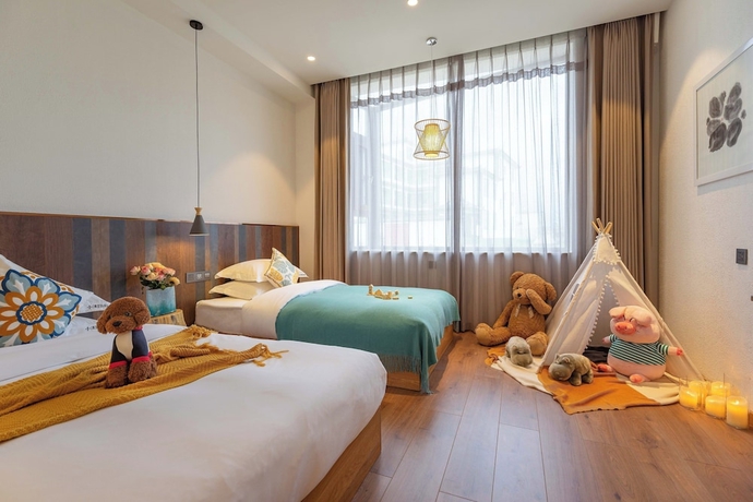 Imagen de la habitación del Hotel Lijiang Snow Mountain Bengu (Shuhe Ancient Town Branch). Foto 2