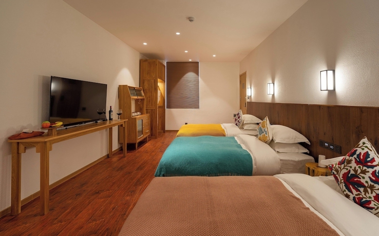 Imagen de la habitación del Hotel Lijiang Snow Mountain Bengu (Shuhe Ancient Town Branch). Foto 4