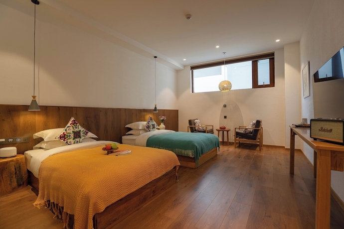 Imagen de la habitación del Hotel Lijiang Snow Mountain Bengu (Shuhe Ancient Town Branch). Foto 8