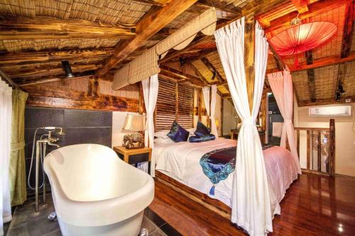 Imagen de la habitación del Hotel Lijiang Spiritual Utopia Hotel. Foto 4