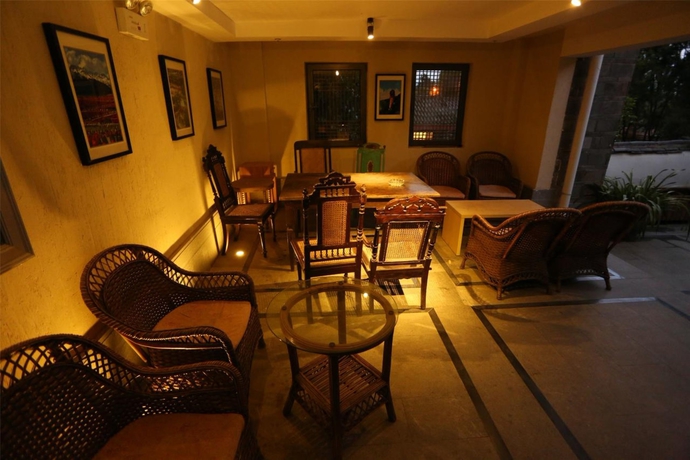 Imagen del bar/restaurante del Hotel Lijiang Starlight Snow Mountain. Foto 4