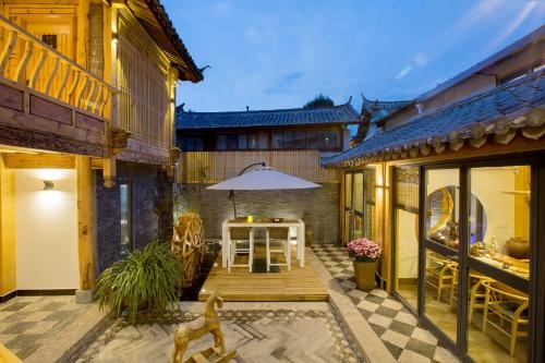 Imagen general del Hotel Lijiang Sunshine Nali Inn. Foto 1