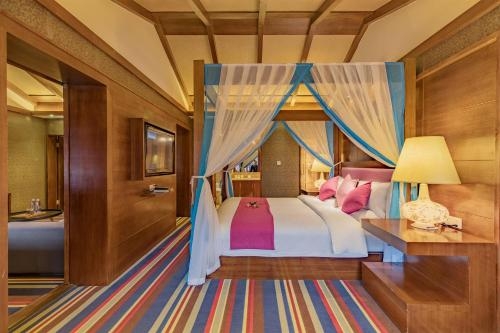 Imagen de la habitación del Hotel Lijiang Sunshine Nali Inn. Foto 7