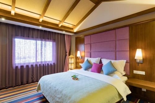 Imagen de la habitación del Hotel Lijiang Sunshine Nali Inn. Foto 8