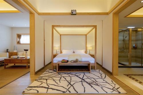 Imagen de la habitación del Hotel Lijiang Sunshine Nali Inn. Foto 10
