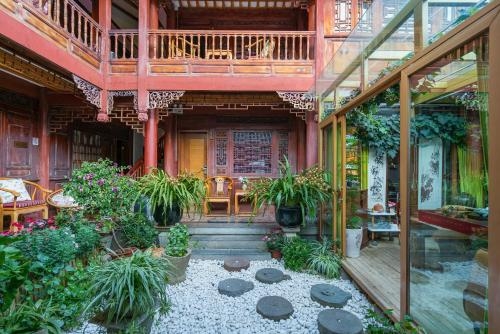 Imagen general del Hotel Lijiang Sunshine Nali Inn. Foto 3