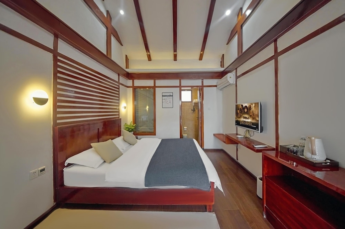 Imagen de la habitación del Hotel Lijiang Tongfu Inn. Foto 5