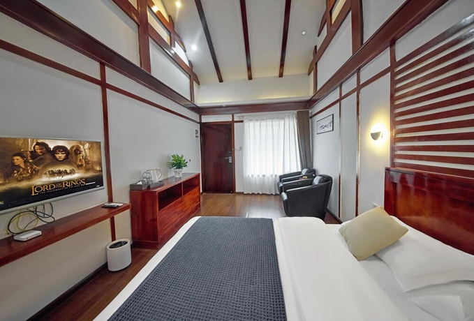 Imagen de la habitación del Hotel Lijiang Tongfu Inn. Foto 6