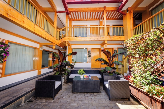 Imagen de los interiores del Hotel Lijiang Tongfu Inn. Foto 13