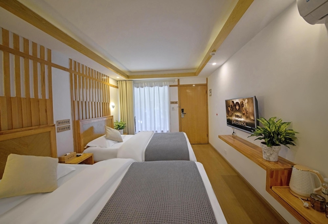Imagen de la habitación del Hotel Lijiang Tongfu Inn. Foto 8