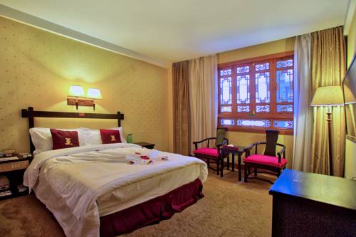Imagen de la habitación del Hotel Lijiang Wangfu. Foto 3
