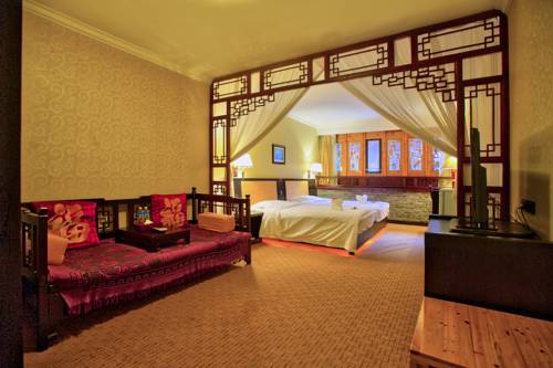 Imagen de la habitación del Hotel Lijiang Wangfu. Foto 7