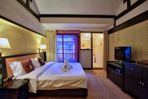 Imagen de la habitación del Hotel Lijiang Wangfu. Foto 9