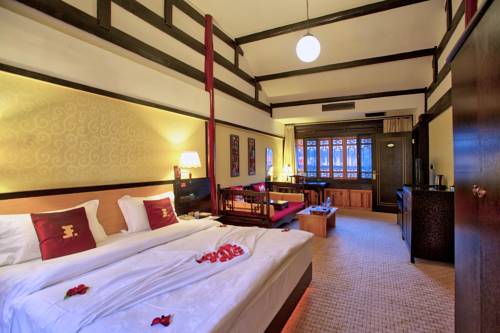 Imagen de la habitación del Hotel Lijiang Wangfu. Foto 11