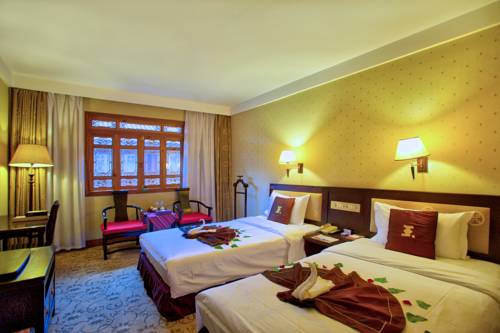 Imagen de la habitación del Hotel Lijiang Wangfu. Foto 12