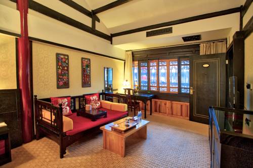 Imagen de la habitación del Hotel Lijiang Wangfu. Foto 14