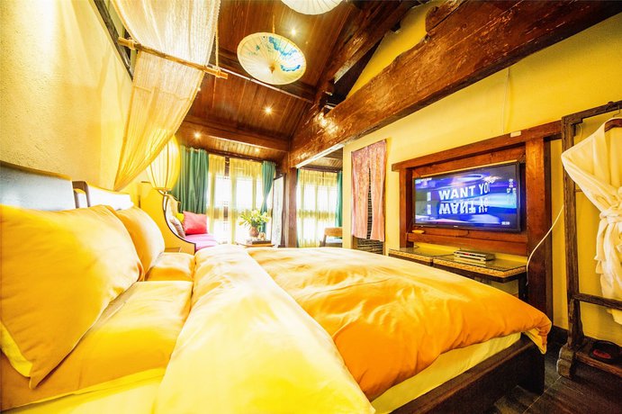 Imagen de la habitación del Hotel Lijiang Wengjia Dayuan. Foto 2