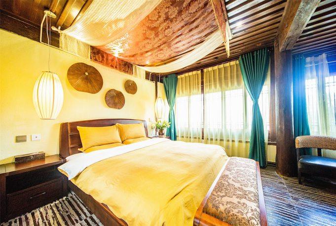 Imagen de la habitación del Hotel Lijiang Wengjia Dayuan. Foto 3