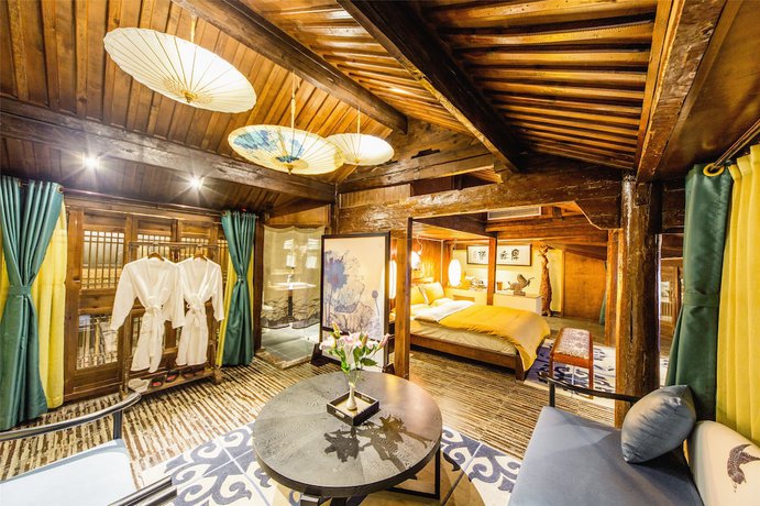 Imagen de la habitación del Hotel Lijiang Wengjia Dayuan. Foto 6