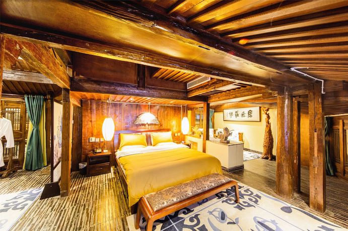 Imagen de la habitación del Hotel Lijiang Wengjia Dayuan. Foto 8